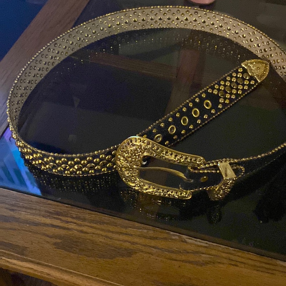 Black and gold bezel belt